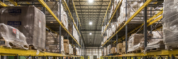 Área 1: Recepción y Descarga de Mercancía